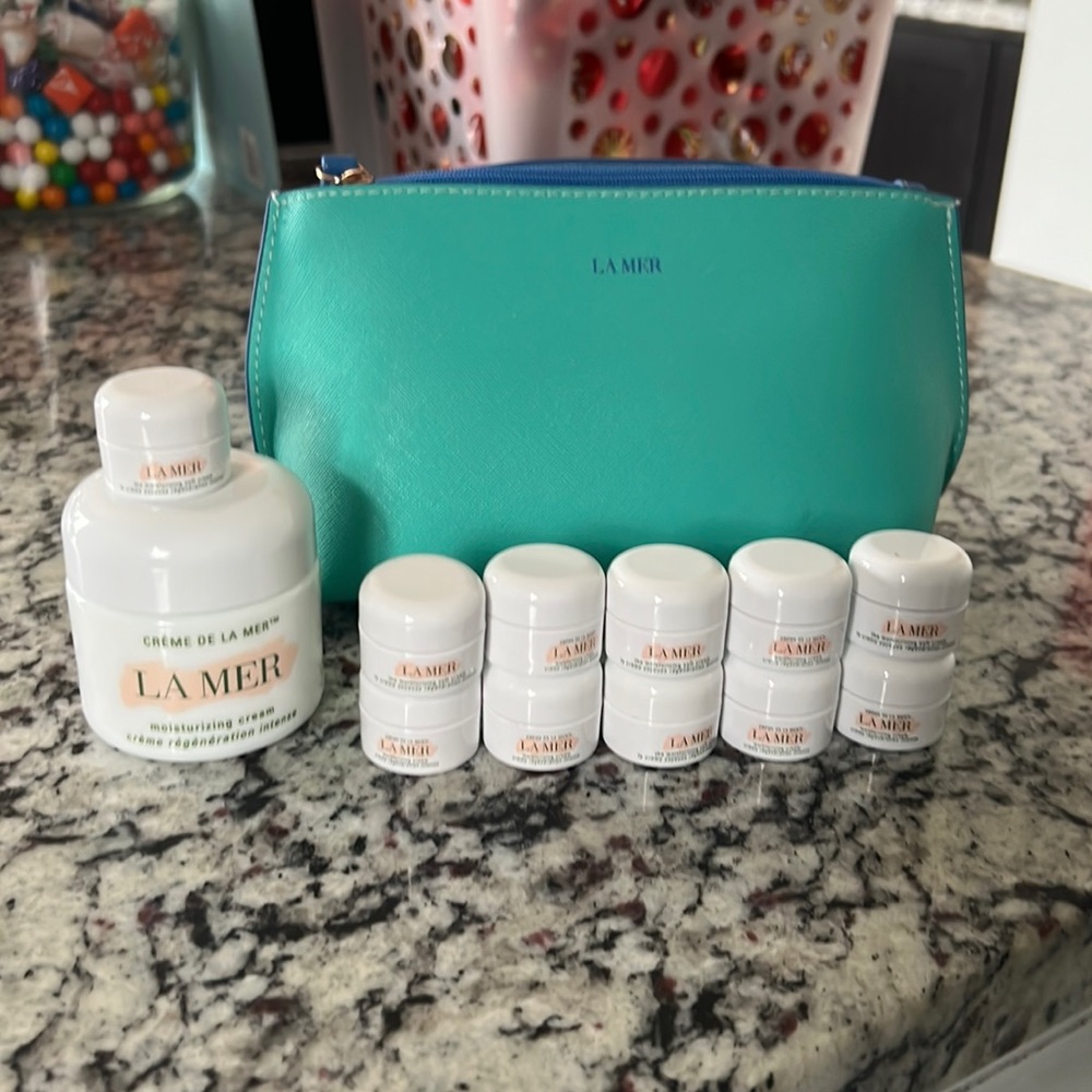 EMPTY jars of La Mer plus bag, great for travel